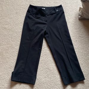 CACHE black dressy zippered capri pants with cuffs. Size 6.